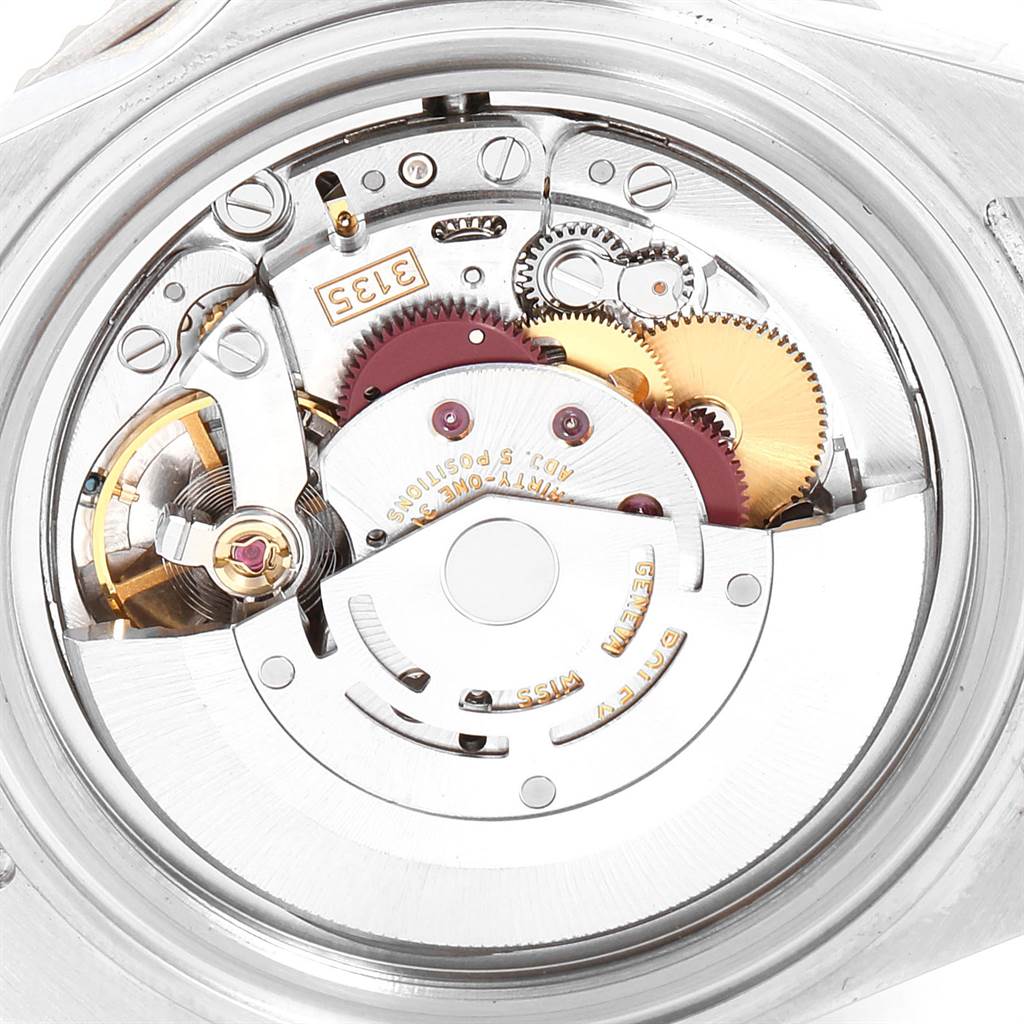 This is an internal view of the Rolex Submariner 16610LV Men's Stainless Steel Black Dial 16610LV Men's Stainless Steel Black Dial's movement, showcasing its gears and mechanisms.