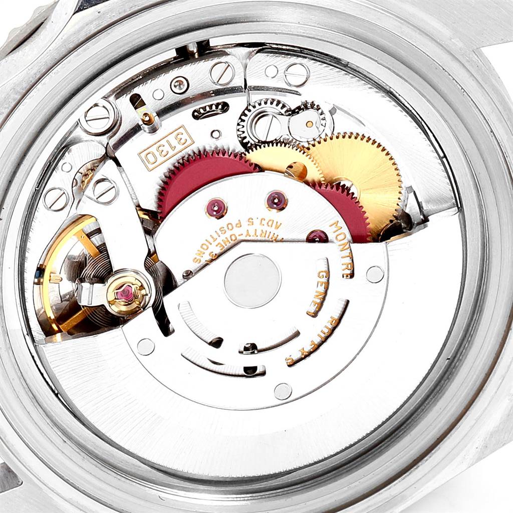 This image shows the internal mechanical movement of a Rolex Submariner 14060 Men's Stainless Steel Black Dial 14060 Men's Stainless Steel Black Dial watch.