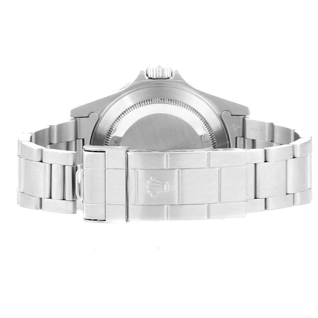 This image shows the rear view of a Rolex Submariner 14060 Men's Stainless Steel Black Dial 14060 Men's Stainless Steel Black Dial watch, featuring its case back and metal bracelet with clasp.