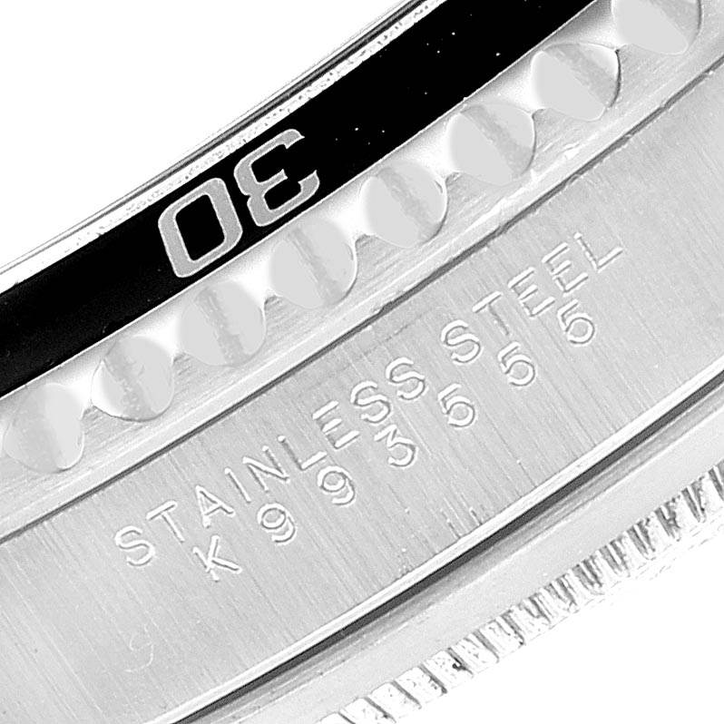 This close-up image shows the bezel with the number 30 and part of the stainless steel case of a Rolex Submariner 14060 Men's Stainless Steel Black Dial 14060 Men's Stainless Steel Black Dial watch.