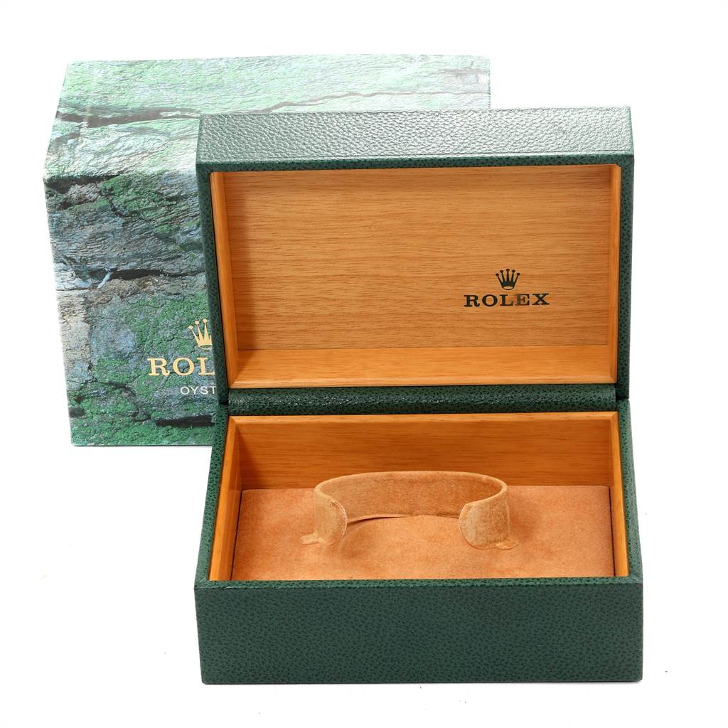 The image shows an open Rolex Submariner 16613 Men's Steel and Gold (two tone) Blue Dial 16613 Men's Steel and Gold (two tone) Blue Dial watch box and its outer packaging from a front angle.