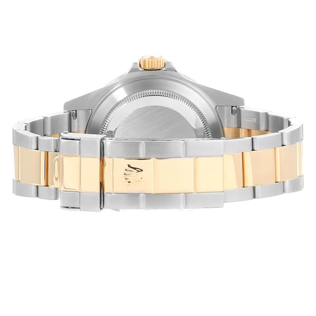 This image shows the back case and bracelet of a Rolex Submariner 16613 Men's Steel and Gold (two tone) Blue Dial 16613 Men's Steel and Gold (two tone) Blue Dial, highlighting the clasp and crown.