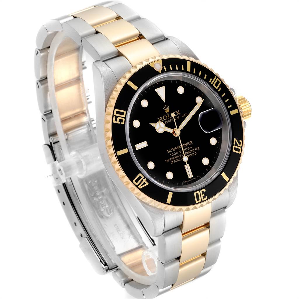 The Rolex Submariner 16613 Men
s Steel and Gold (two tone) Black Dial 16613 Men
s Steel and Gold (two tone) Black Dial watch is shown at a three-quarter angle, displaying the dial, bezel, and two-tone bracelet.