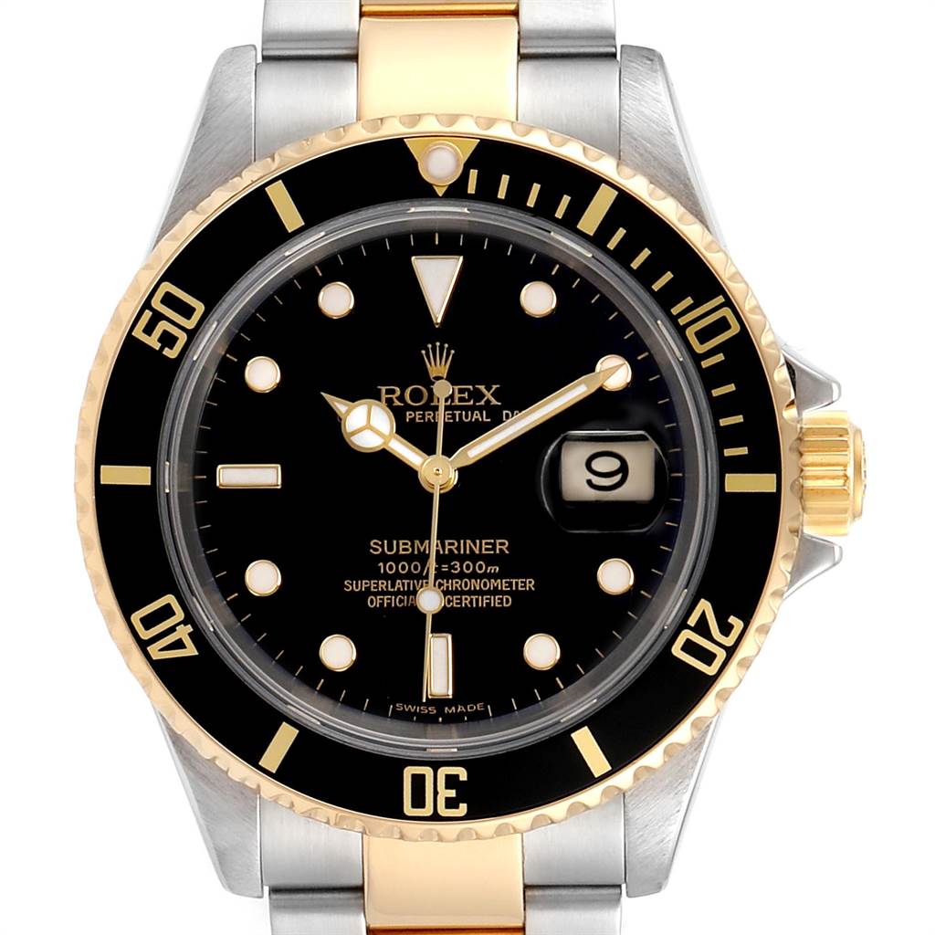The image shows a Rolex Submariner 16613 Men
s Steel and Gold (two tone) Black Dial 16613 Men
s Steel and Gold (two tone) Black Dial watch from a front angle, highlighting the black dial, gold accents, and date window.