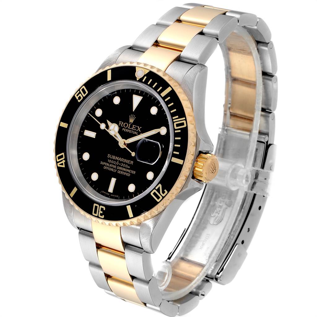This image shows a Rolex Submariner 16613 Men
s Steel and Gold (two tone) Black Dial 16613 Men
s Steel and Gold (two tone) Black Dial watch at an angle highlighting its face, bezel, and two-tone bracelet.