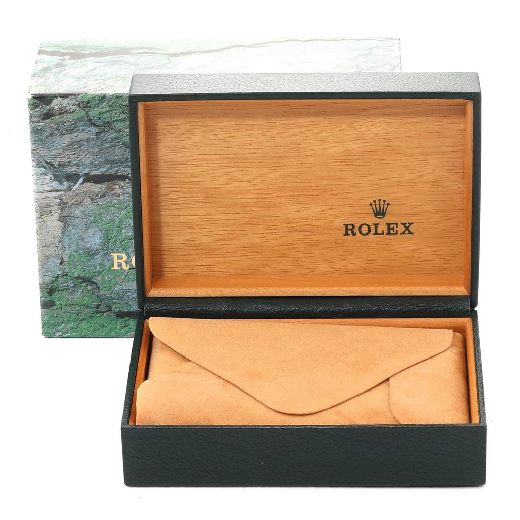 The image shows an open storage box for a Rolex Submariner 14060 Men's Stainless Steel Black Dial 14060 Men's Stainless Steel Black Dial watch, displaying the inner cushioning and wood interior.