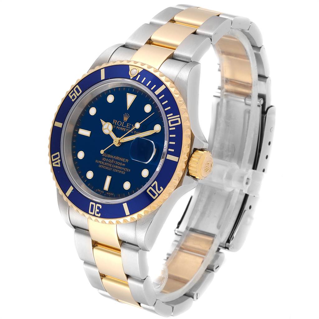The image shows a Rolex Submariner 16613 Men
s Steel and Gold (two tone) Blue Dial 16613 Men
s Steel and Gold (two tone) Blue Dial watch at a three-quarter angle, highlighting its blue dial, bezel, and two-tone metal bracelet.