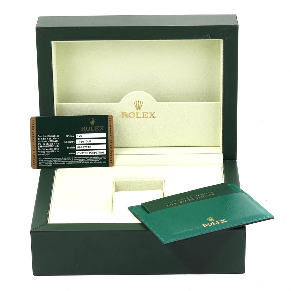 The image shows the open box and warranty card for a Rolex Submariner 116610LV Men
s Stainless Steel Green Dial 116610LV Men
s Stainless Steel Green Dial, without the watch.