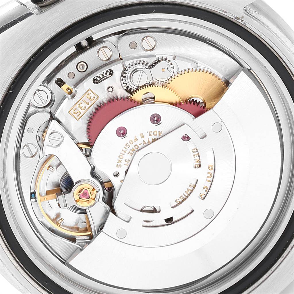 This image shows a close-up view of the movement and internal mechanisms of a Rolex Submariner 116610LV Men
s Stainless Steel Green Dial 116610LV Men
s Stainless Steel Green Dial watch.