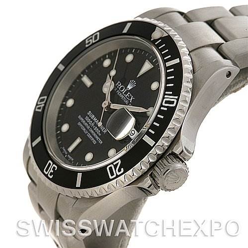 The image shows a close-up of the Rolex Submariner 16610 Men's Stainless Steel Black Dial 16610 Men's Stainless Steel Black Dial watch's face, bezel, crown, and part of the bracelet from a side angle.