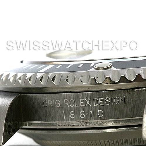 The image shows a close-up side angle of the bezel and case of a Rolex Submariner 16610 Men's Stainless Steel Black Dial 16610 Men's Stainless Steel Black Dial model 16610 watch.