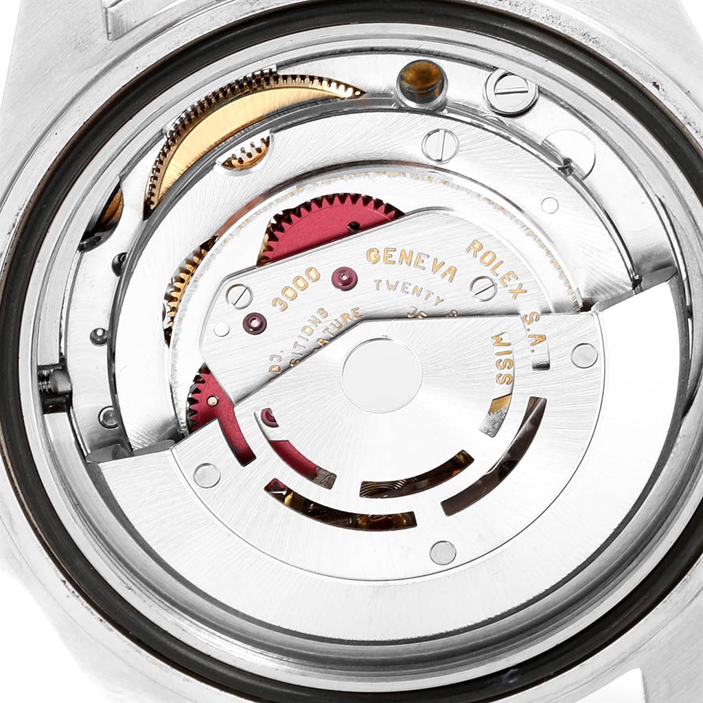 The image shows the internal mechanical movement of the Rolex Submariner 14060 Men's Stainless Steel Black Dial 14060 Men's Stainless Steel Black Dial watch model viewed from a close-up angle.