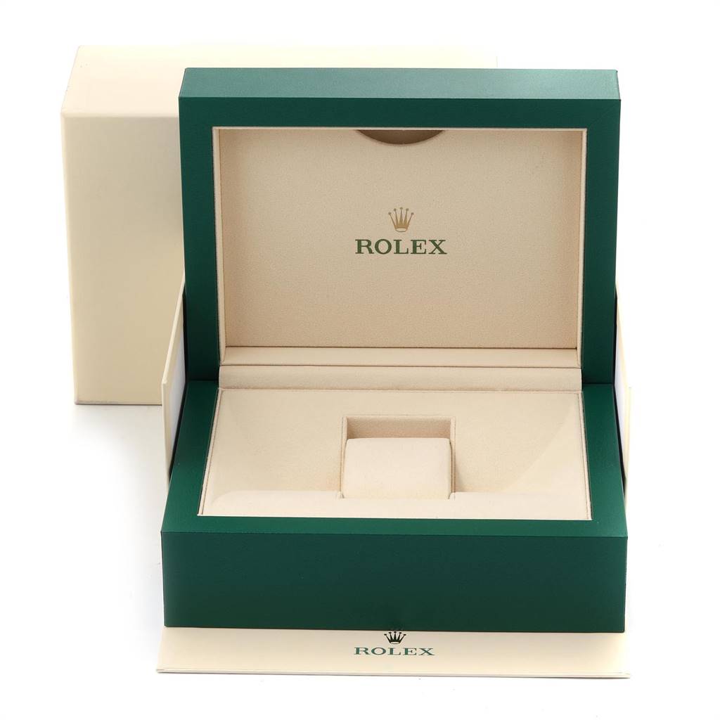 The image shows an open Rolex Submariner 116613 Men
s Steel and Gold (two tone) Blue Dial 116613 Men
s Steel and Gold (two tone) Blue Dial watch box from a front angle, revealing its cushioned interior.