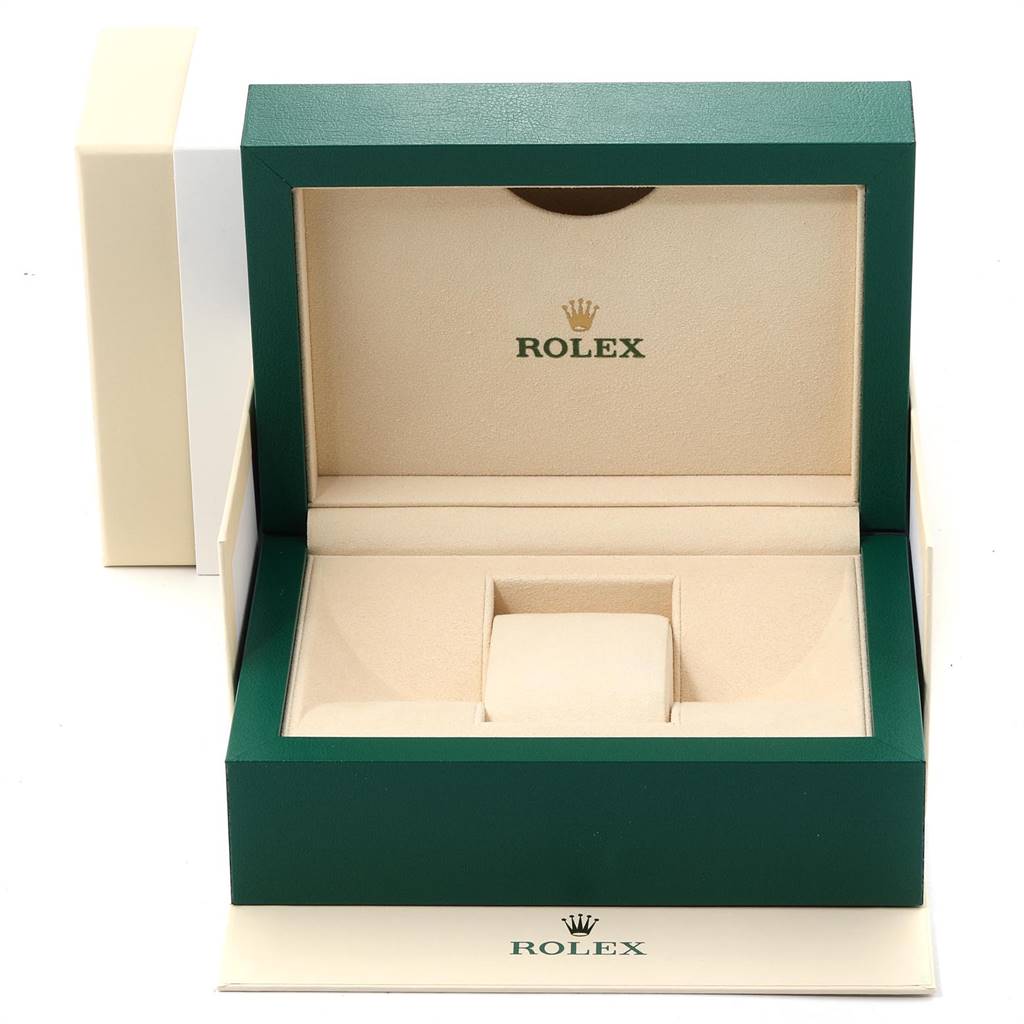 The image shows an open Rolex Submariner 116610LV Men
s Stainless Steel Green Dial 116610LV Men
s Stainless Steel Green Dial watch box at a straight-on angle, featuring the green outer box and beige interior.