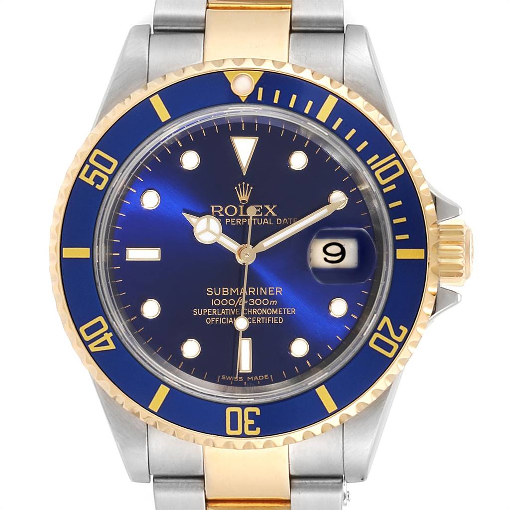 The image shows a front view of a Rolex Submariner 16613 Men's Steel and Gold (two tone) Blue Dial 16613 Men's Steel and Gold (two tone) Blue Dial watch, highlighting its blue dial, date window, and two-tone bracelet.