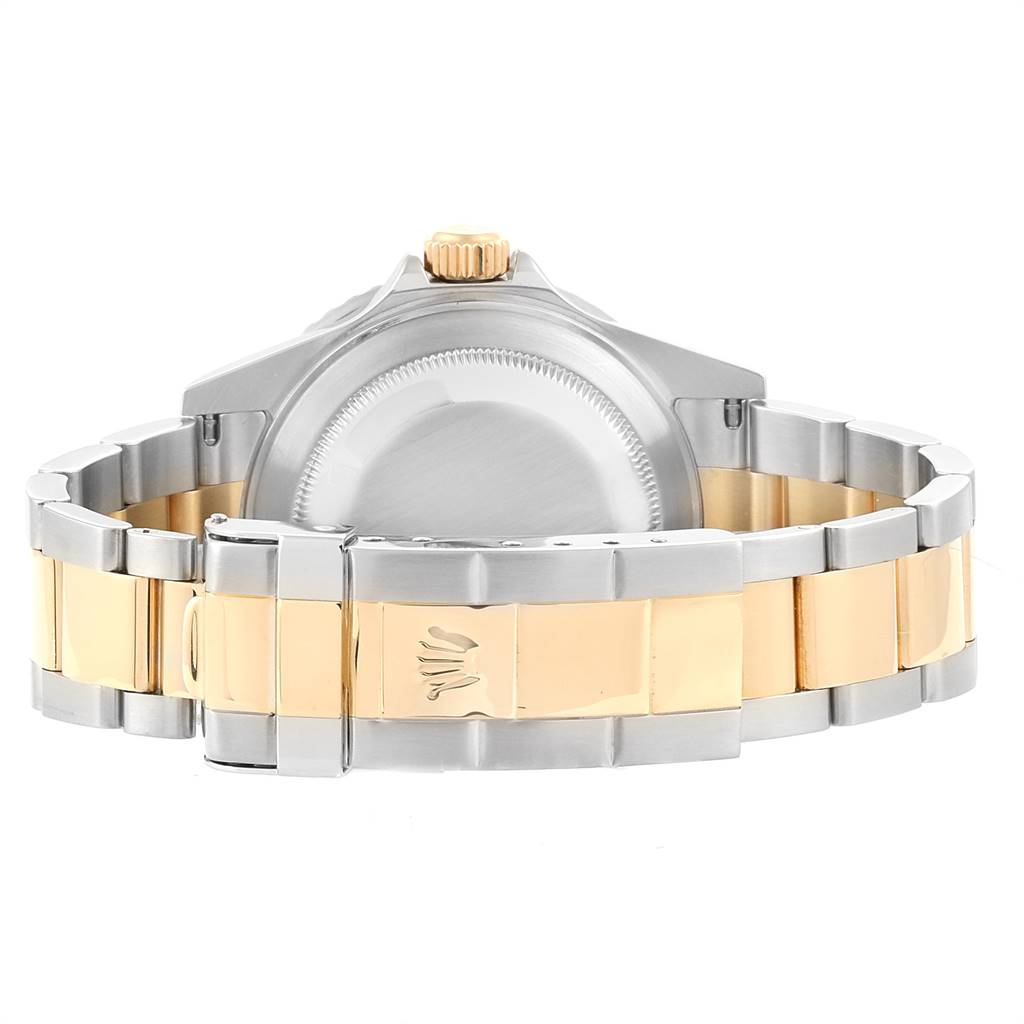 The image shows the back of a Rolex Submariner 16613 Men's Steel and Gold (two tone) Blue Dial 16613 Men's Steel and Gold (two tone) Blue Dial watch, highlighting the two-tone bracelet and clasp.