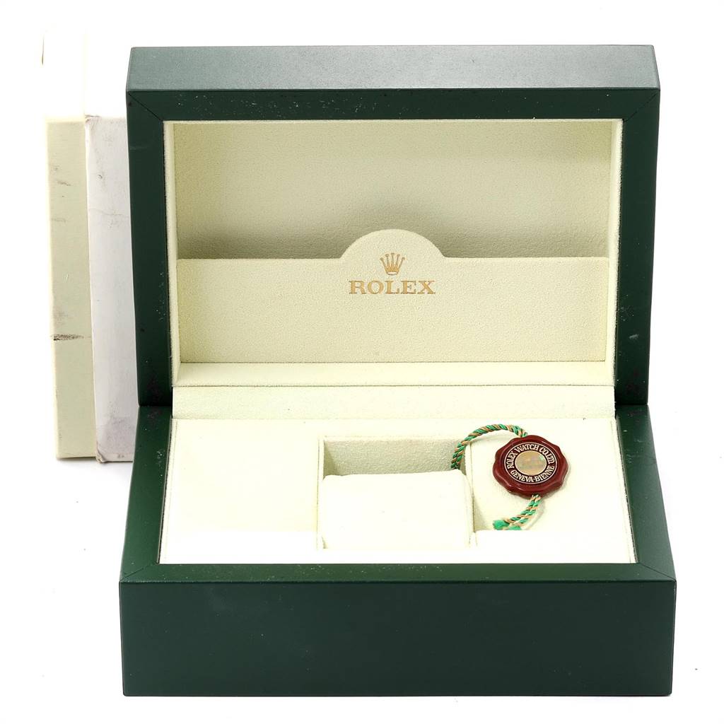 The image shows a Rolex Submariner 16613 Men's Steel and Gold (two tone) Blue Dial 16613 Men's Steel and Gold (two tone) Blue Dial watch box, open, with a Rolex seal accessory inside.