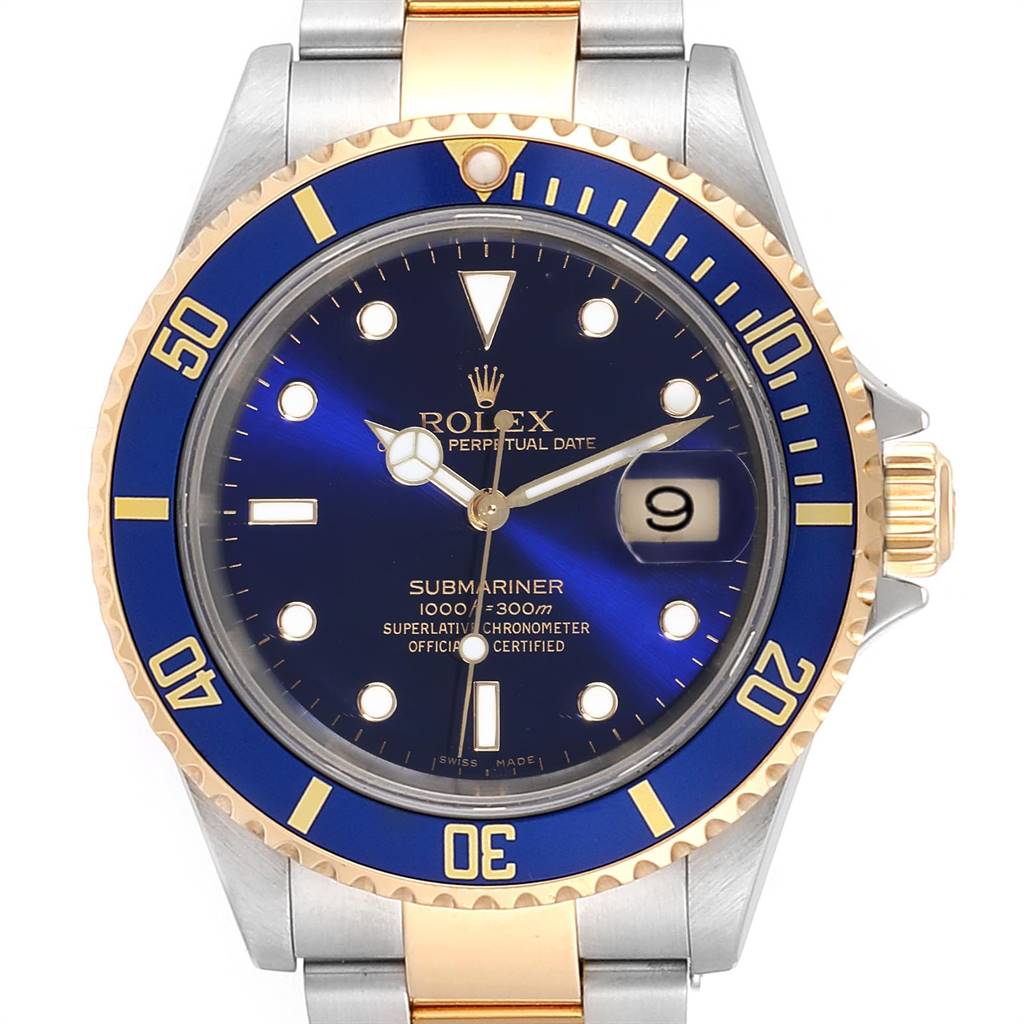 The image shows a close-up, front view of a Rolex Submariner 16613 Men's Steel and Gold (two tone) Blue Dial 16613 Men's Steel and Gold (two tone) Blue Dial watch with a blue dial and a two-tone metal bracelet.