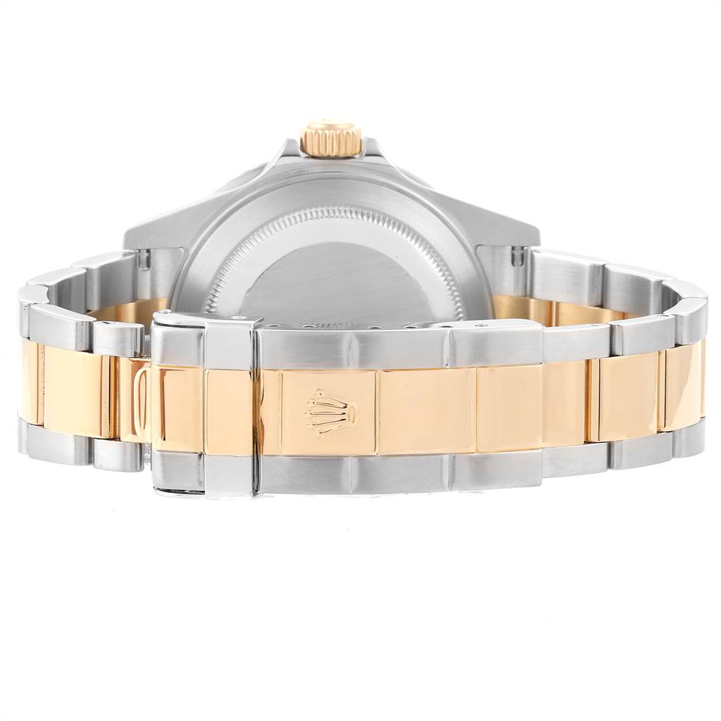 This image shows the back case and bracelet of a Rolex Submariner 16613 Men's Steel and Gold (two tone) Blue Dial 16613 Men's Steel and Gold (two tone) Blue Dial watch, highlighting the two-tone metal finish.