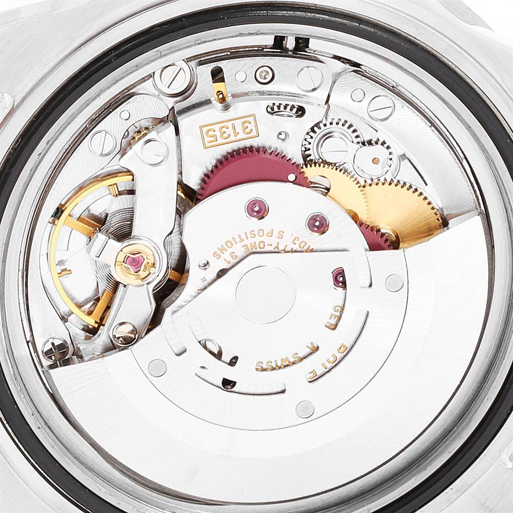 This image shows the internal mechanical movement of a Rolex Submariner 16610 Men
s Stainless Steel Black Dial 16610 Men
s Stainless Steel Black Dial watch from a top-down angle.