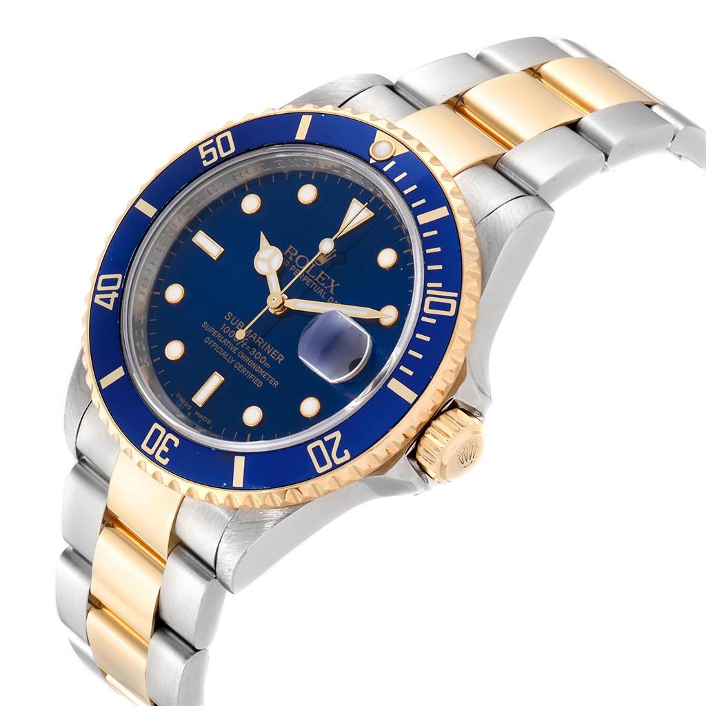 The Rolex Submariner 16613 Men
s Steel and Gold (two tone) Blue Dial 16613 Men
s Steel and Gold (two tone) Blue Dial watch is shown at an angled top view displaying the bezel, dial, crown, and bracelet.