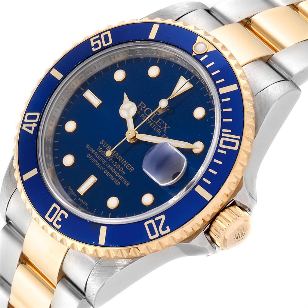 The angle showcases the Rolex Submariner 16613 Men
s Steel and Gold (two tone) Blue Dial 16613 Men
s Steel and Gold (two tone) Blue Dial
s face, bezel, and part of the bracelet and crown.