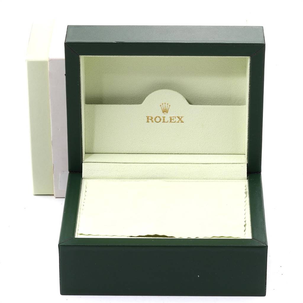 This image shows the open box and packaging for a Rolex Submariner 16613 Men
s Steel and Gold (two tone) Blue Dial 16613 Men
s Steel and Gold (two tone) Blue Dial watch.