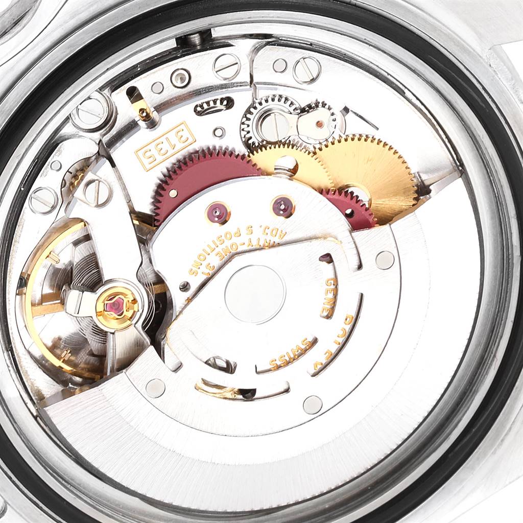 This image shows a close-up of the internal mechanical movement of a Rolex Submariner 16610 Men
s Stainless Steel Black Dial 16610 Men
s Stainless Steel Black Dial watch.