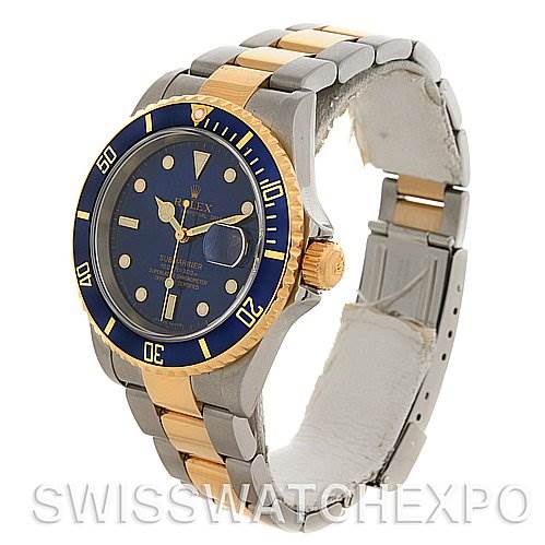 The image shows a Rolex Submariner 16613 Men's Yellow Gold Blue Dial 16613 Men's Yellow Gold Blue Dial watch at a slight angle from the front, displaying the blue dial, bezel, and two-tone bracelet.
