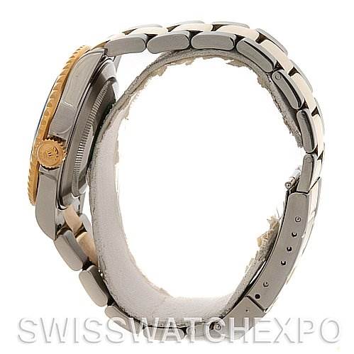 The image shows the side profile of a Rolex Submariner 16613 Men's Yellow Gold Blue Dial 16613 Men's Yellow Gold Blue Dial watch, highlighting the bezel, crown, and bracelet.