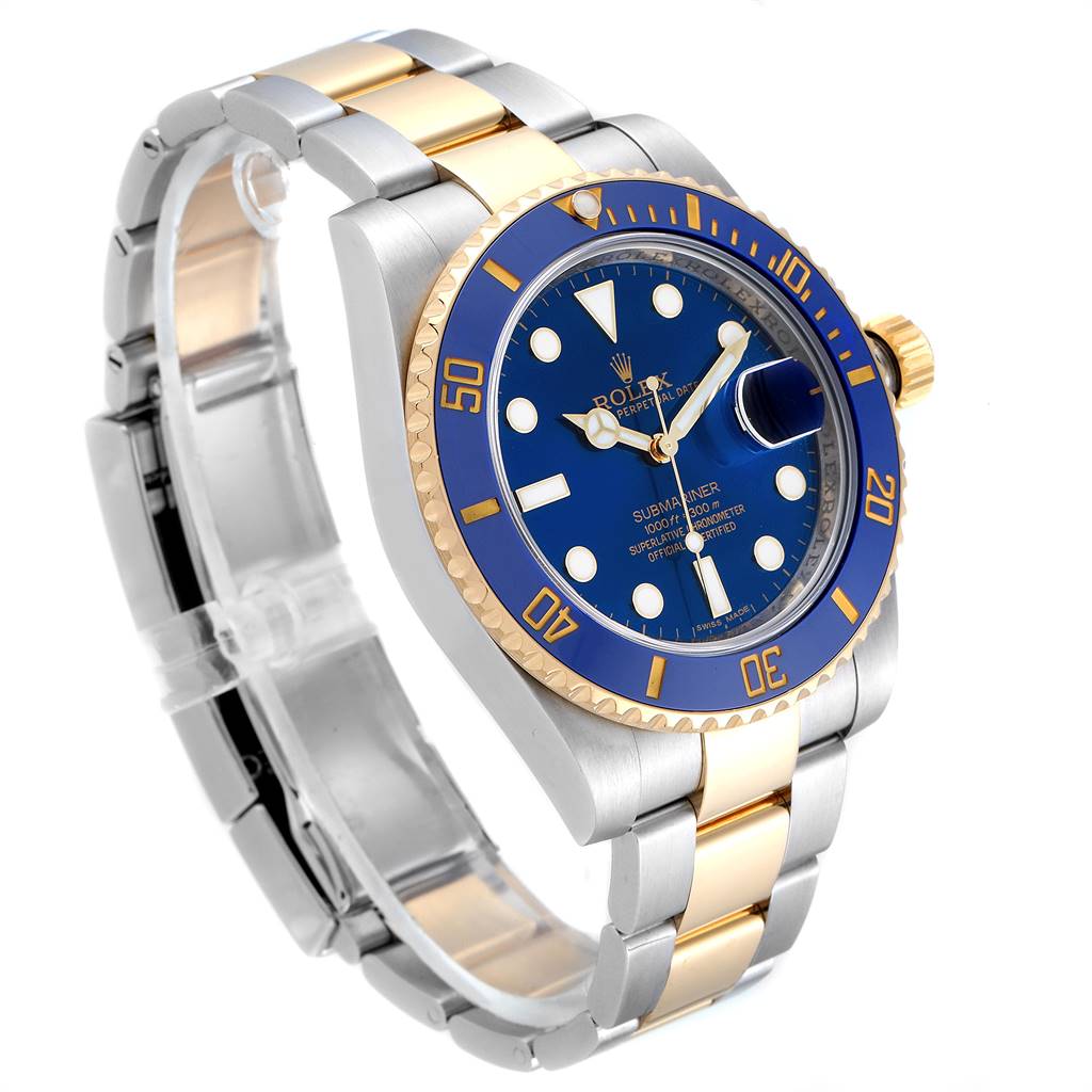 This image shows a Rolex Submariner 116613 Men's Steel and Gold (two tone) Blue Dial 116613 Men's Steel and Gold (two tone) Blue Dial watch at an angled side view, highlighting its blue dial, bezel, and two-tone bracelet.