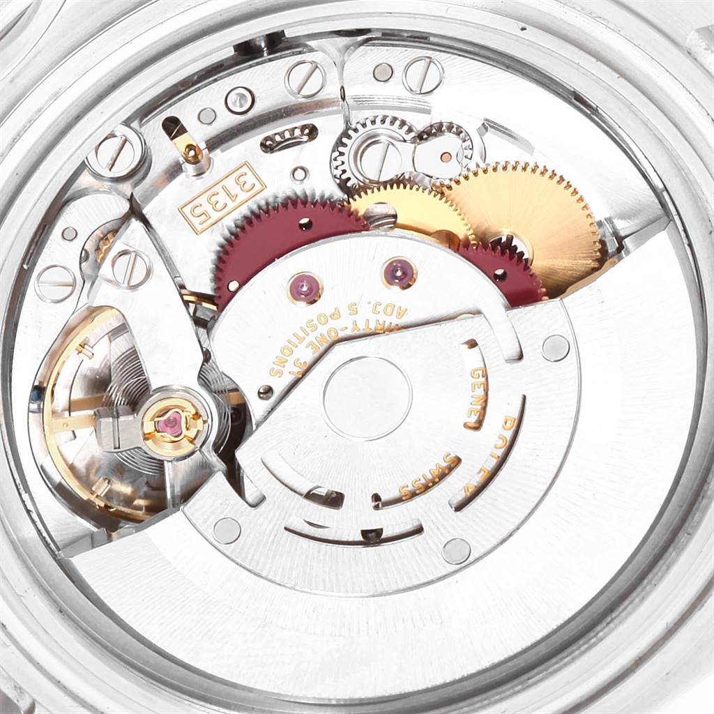 This image shows the intricate internal movement of a Rolex Submariner 16610LV Men's Stainless Steel Black Dial 16610LV Men's Stainless Steel Black Dial watch viewed from the back.