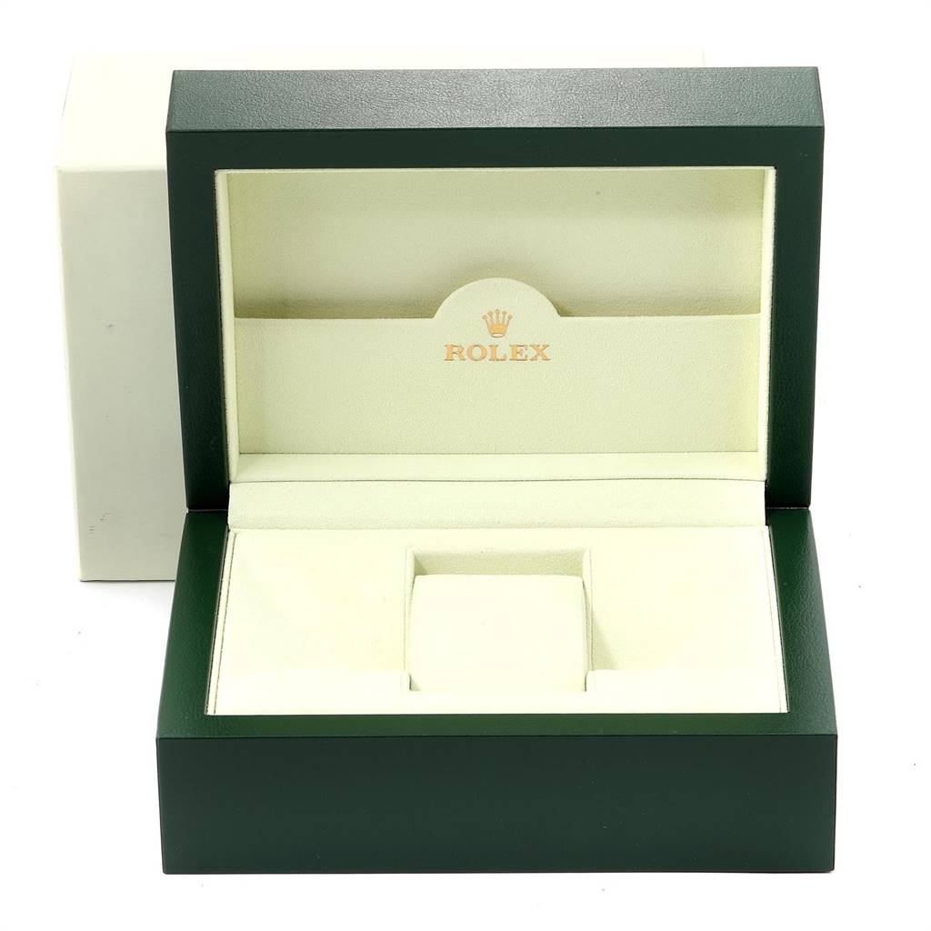 The image shows an open Rolex Submariner 16610 Men
s Stainless Steel Black Dial 16610 Men
s Stainless Steel Black Dial watch box, revealing its interior compartments and branding.