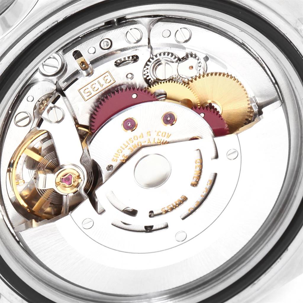 This is a close-up view of the movement and internal gears of a Rolex Submariner 16610 Men
s Stainless Steel Black Dial 16610 Men
s Stainless Steel Black Dial watch.