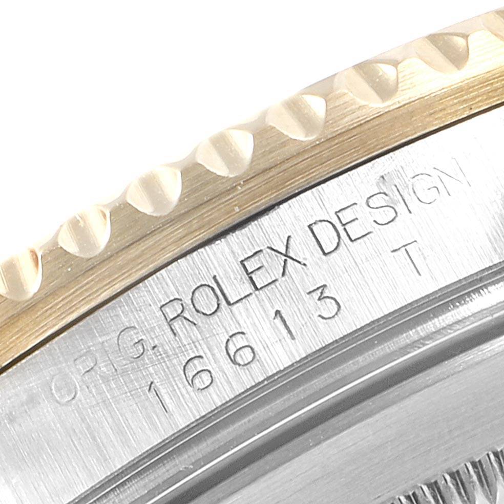 This image shows a close-up of the case side and edge of the bezel on a Rolex Submariner 16613 Men
s Steel and Gold (two tone) Blue Dial 16613 Men
s Steel and Gold (two tone) Blue Dial model.