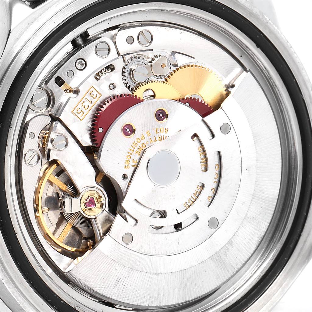 This image displays the internal mechanical movement of a Rolex Submariner 16610 Men's Stainless Steel Black Dial 16610 Men's Stainless Steel Black Dial watch from a close-up, top-down angle.