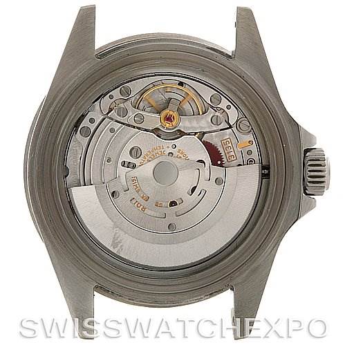 This image shows the back view of a Rolex Submariner 16610 Men's Stainless Steel Black Dial 16610 Men's Stainless Steel Black Dial watch, focusing on the visible internal movement and mechanical parts.