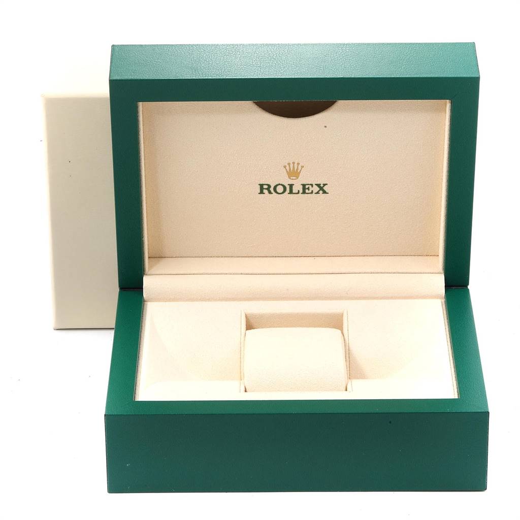 This image shows an empty Rolex Submariner 116613 Men
s Steel and Gold (two tone) Black Dial 116613 Men
s Steel and Gold (two tone) Black Dial watch box, open to display its beige interior.
