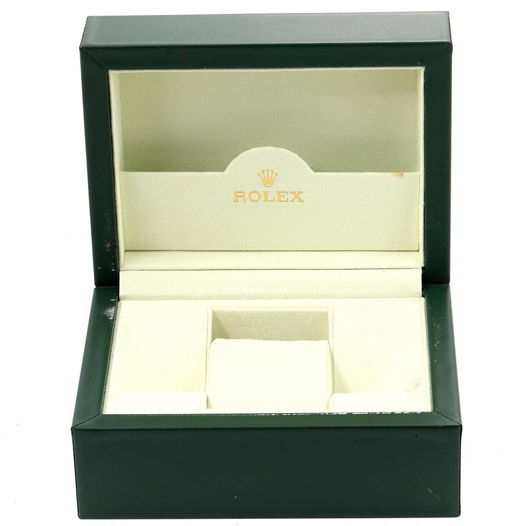 This is an open Rolex Submariner 16610 Men
s Stainless Steel Black Dial 16610 Men
s Stainless Steel Black Dial watch box showing its interior compartments with the Rolex logo.