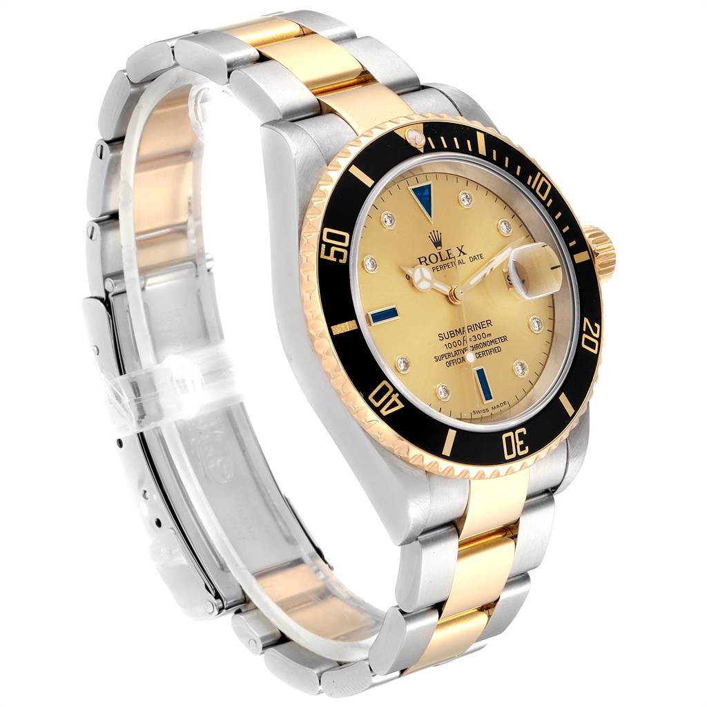 This image shows a Rolex Submariner 16613 Men's Steel and Gold (two tone) Champagne Dial 16613 Men's Steel and Gold (two tone) Champagne Dial watch at a three-quarter angle, displaying the bezel, dial, and bracelet.