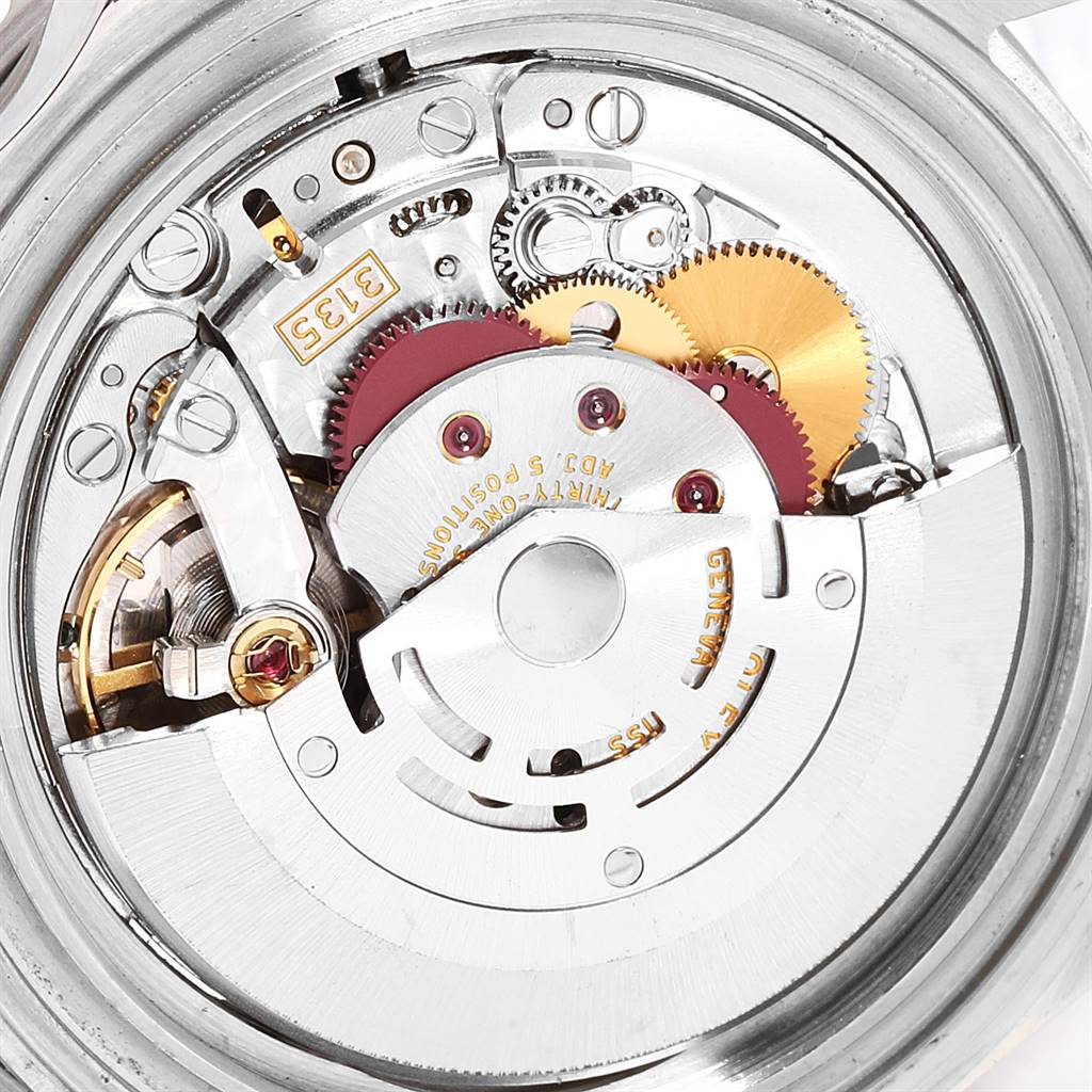 This image shows an up-close view of the movement mechanism inside a Rolex Submariner 16610 Men
s Stainless Steel Black Dial 16610 Men
s Stainless Steel Black Dial watch.