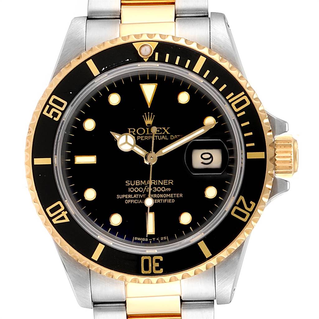 This image shows a frontal view of a Rolex Submariner 16803 Men
s Steel and Gold (two tone) Black Dial 16803 Men
s Steel and Gold (two tone) Black Dial watch, highlighting its bezel, dial, hands, bracelet, and date function.