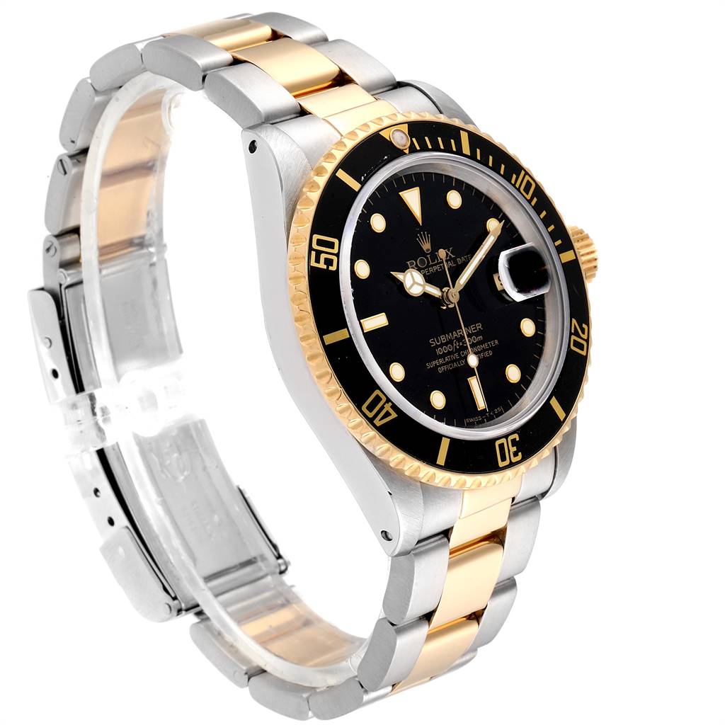 The Rolex Submariner 16803 Men
s Steel and Gold (two tone) Black Dial 16803 Men
s Steel and Gold (two tone) Black Dial watch is shown at a tilted side angle, displaying the face, bezel, and part of the two-tone bracelet.