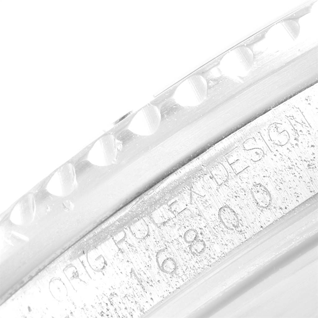 This image shows a close-up of the side engraving and bezel edge of a Rolex Submariner 16800 Men
s Stainless Steel Black Dial 16800 Men
s Stainless Steel Black Dial watch.