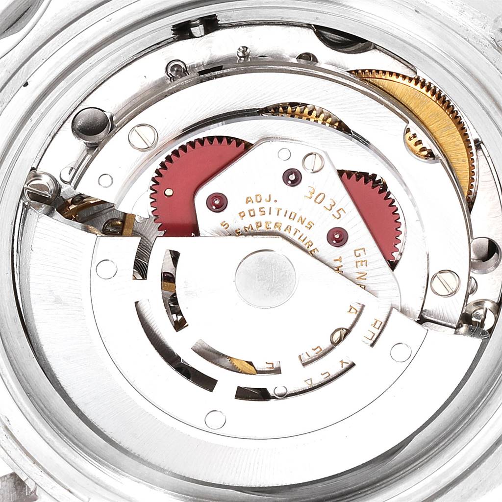 The image shows the internal automatic movement mechanism of the Rolex Submariner 16800 Men
s Stainless Steel Black Dial 16800 Men
s Stainless Steel Black Dial watch from a top-down angle.