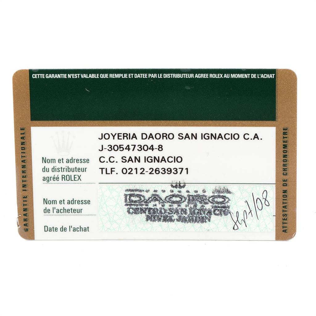 This image shows a warranty card for a Rolex Submariner 16613 Men
s Steel and Gold (two tone) Blue Dial 16613 Men
s Steel and Gold (two tone) Blue Dial watch, displaying distributor information and purchase date.