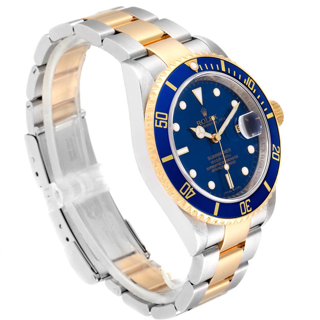 The image shows a side angle of the Rolex Submariner 16613 Men
s Steel and Gold (two tone) Blue Dial 16613 Men
s Steel and Gold (two tone) Blue Dial watch, displaying the dial, bezel, crown, and two-tone bracelet.