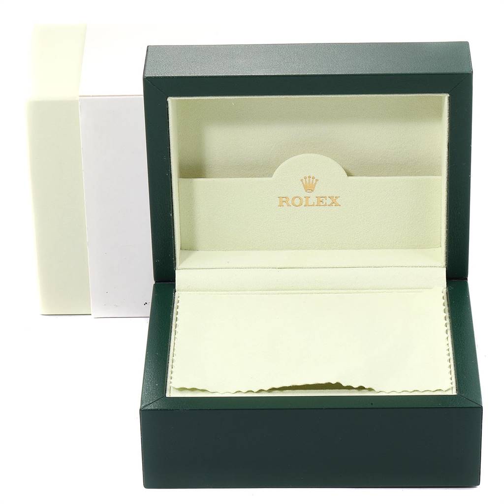 This image shows an empty Rolex Submariner 16610 Men
s Stainless Steel Black Dial 16610 Men
s Stainless Steel Black Dial watch box with a white outer shell and a green inner display box lined with fabric.