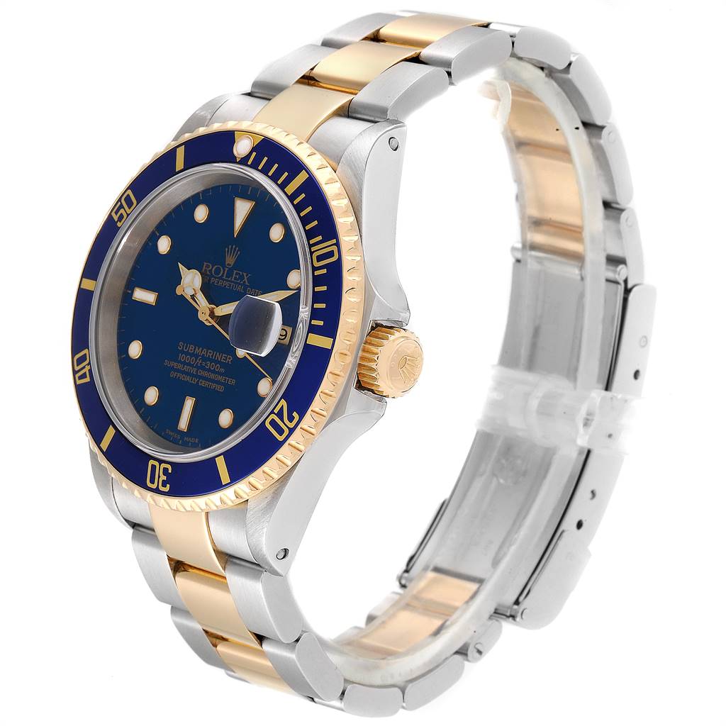 The image shows a side angle of a Rolex Submariner 16613 Men
s Steel and Gold (two tone) Blue Dial 16613 Men
s Steel and Gold (two tone) Blue Dial watch, highlighting its bezel, dial, and two-tone bracelet.