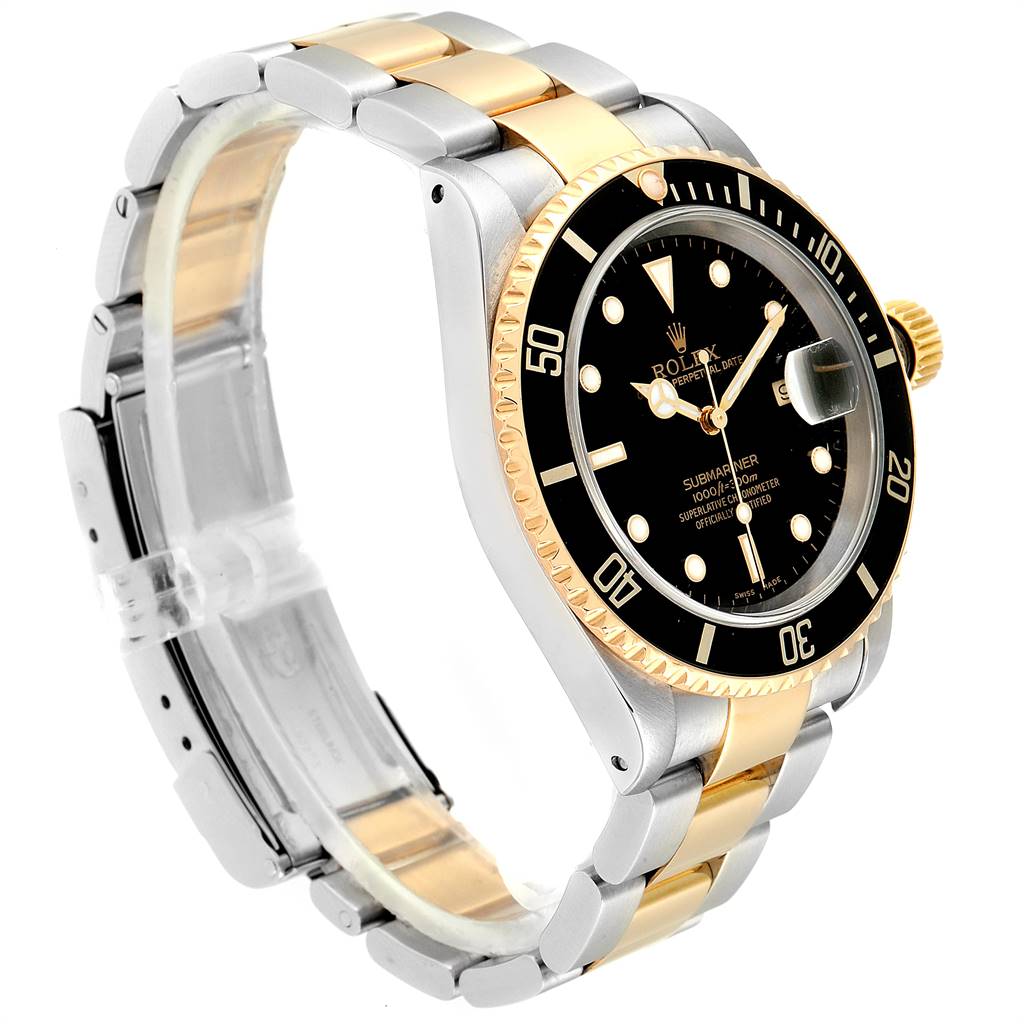 The image shows a Rolex Submariner 16613 Men's Steel and Gold (two tone) Black Dial 16613 Men's Steel and Gold (two tone) Black Dial watch at a three-quarter angle, highlighting its bezel, dial, crown, and two-tone bracelet.